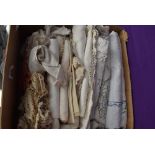 A box of vintage and antique table linen and similar, embroidered and damask examples included.