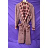 A 1940s/50s gents red wool dressing gown with cord belt,larger size, great condition.