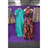 A collection of vintage dresses and skirts including vibrant floral halter neck Tina Warren dress