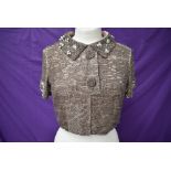 An antique richly beaded short jacket,around 1920s/30s.