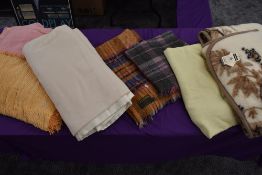 Seven vintage and retro bed covers,throws and blankets.