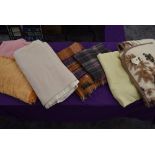 Seven vintage and retro bed covers,throws and blankets.