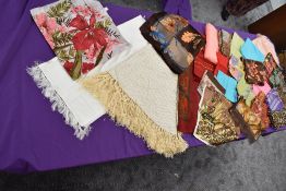 A mixture of vintage headscarves, various styles and colours,fabrics and eras.