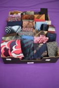 A box full of vintage gents ties, various styles and eras.