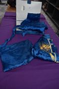 A vintage Chinese pyjama and dressing gown set in blue having gold dragon embroidery in case,