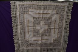 An antique alter cloth having cross to centre and various intricate techniques used throughout.