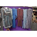 A selection of vintage and retro Ladies dresses in a variety of fabrics, patterns and styles.