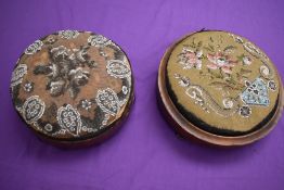 Two Victorian wooden foot rests having needlework and beading to cushions.