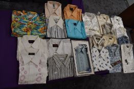 Twenty one gents vintage and retro shirts, a lot still in packaging, various styles and designs.