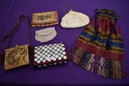 Six vintage and antique bags including drawstring bag with fringing to bottom, beaded art deco