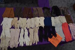 A large collection of ladies vintage gloves, various styles,lengths and colours and fabrics