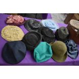 A hat case containing assorted vintage hats, 1940s to late 60s/early 70s.