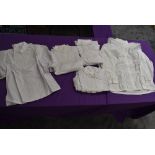 A selection of victorian styled retro blouses, in packaging.