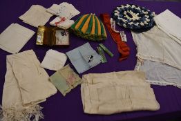 A mixed collection of ladies items and accessories including handkerchiefs, tea cosy with ceramic