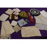 A mixed collection of ladies items and accessories including handkerchiefs, tea cosy with ceramic