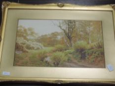 A pair of watercolours, Sidney P Winder, river landscapes, signed and dated 1917, each 29 x 45cm,