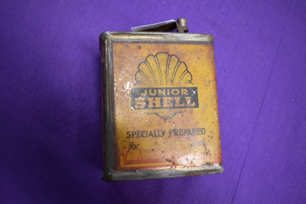 A vintage garage oil can for Shell Junior