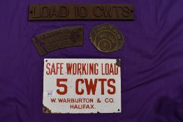 A selection of industrial crane badges including enamel cast iron and brass