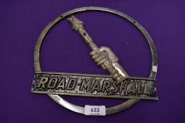 A vintage cast metal sign for Road Marshall