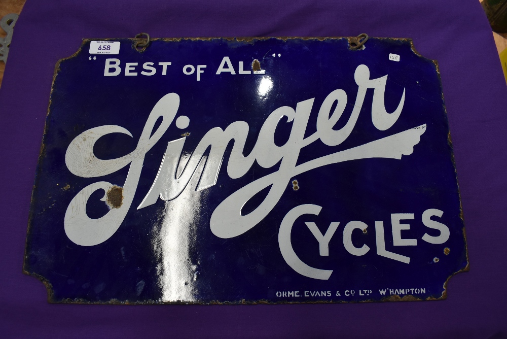 A genuine double sided enamel garage or shop sign for Singer Cycles in good condition