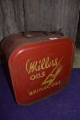 A large five gallon tank with lid for Millers Oils