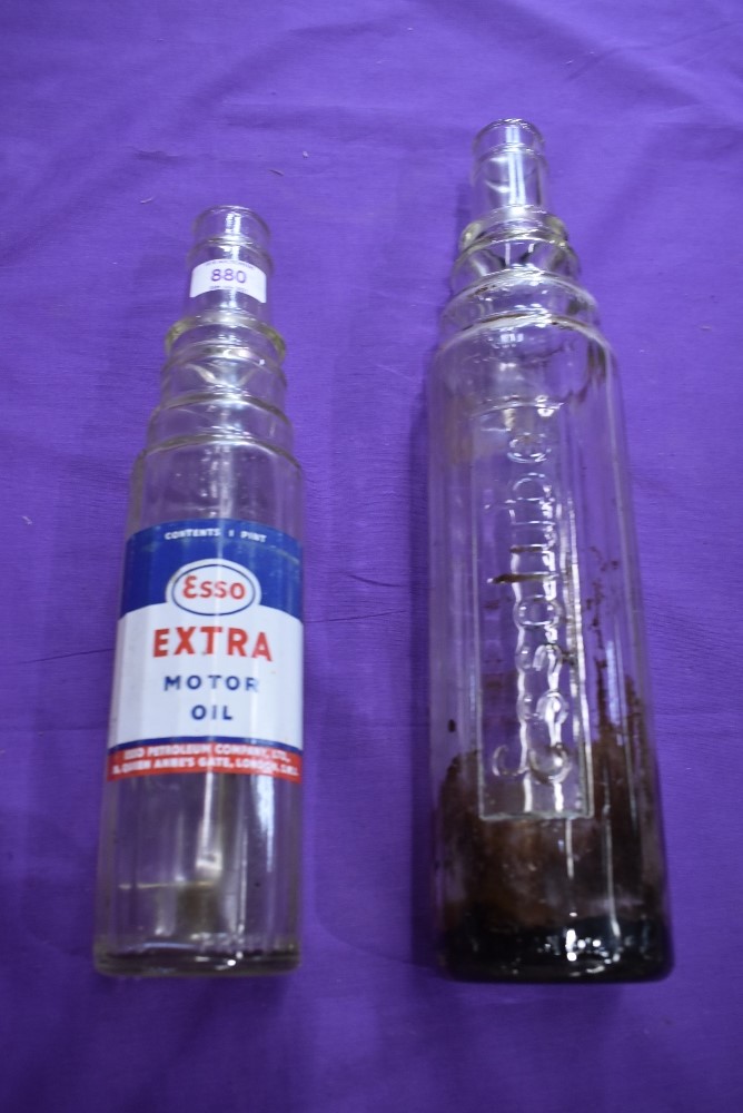 Two garage forecourt oil bottles including Esso and Esso lube