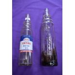 Two garage forecourt oil bottles including Esso and Esso lube