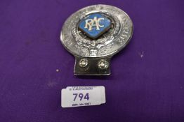 A vintage motor car engine hood badge for RAC