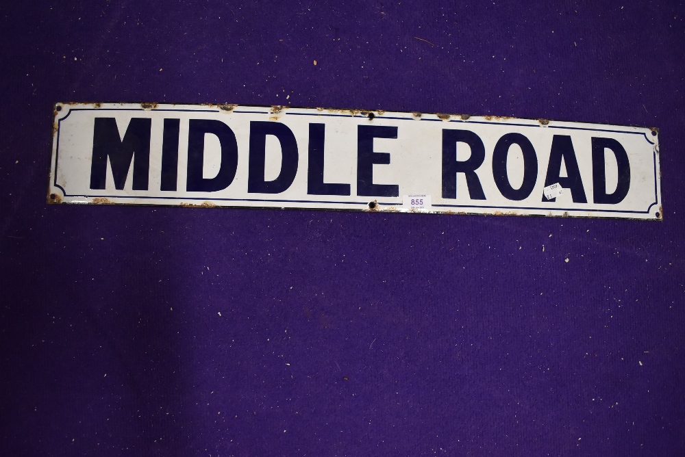 A vintage road side enamel sign reading Middle Road