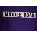 A vintage road side enamel sign reading Middle Road