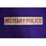 A vintage sign for the Military Police