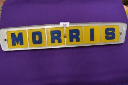 A vintage acrylic sign for Morris motors