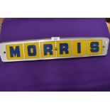 A vintage acrylic sign for Morris motors