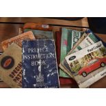 A selection of motoring ephemera and instruction manuals for Ford manuals