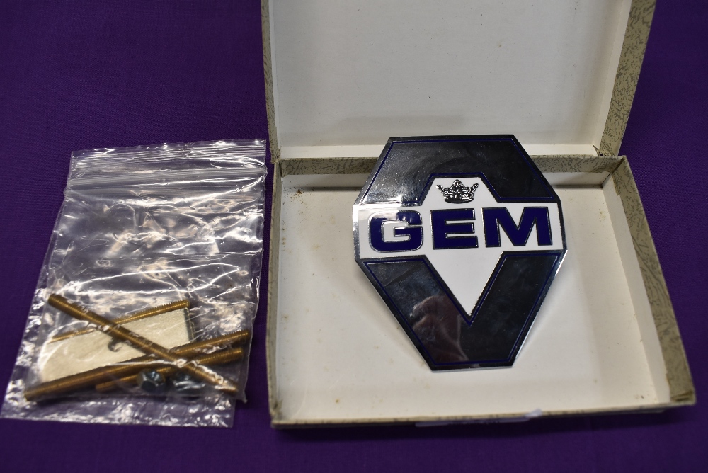 A motor car engine badge for GEM motoring assist