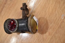 A vintage motor or cycle rear lamp by Miller