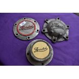 Three vintage lorry hub caps, including Bristol.