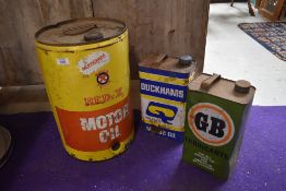 An assortment of vintage oil tins.