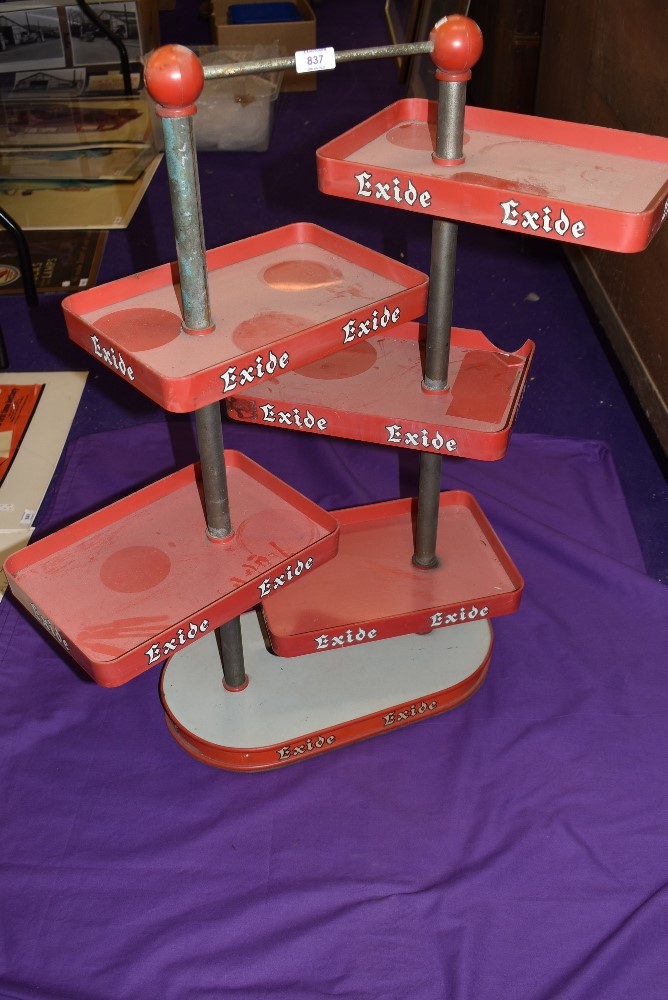 A vintage garage forecourt advertising stand for Exide battery