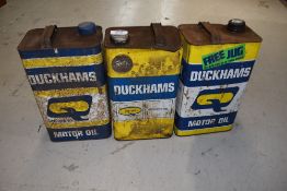 Three garage oil cans for Duckham's