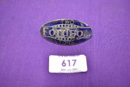 A vintage enamel motor truck badge reading Fordson Two Tons