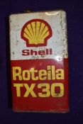A vintage garage oil can for Shell Rotella 5litres