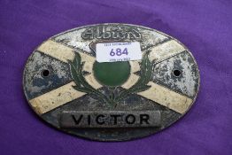 An Albion victor radiator badge.