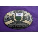 An Albion victor radiator badge.