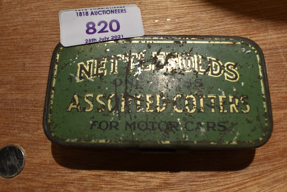 A tin of Nettlefolds one cross motor car cotters with contents