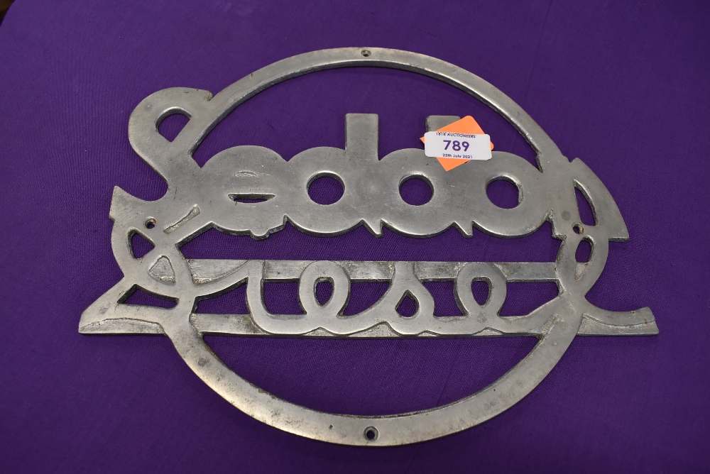 A larger cast metal sign for Seddon Diesel