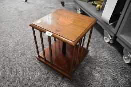 An Edwardian revolving book case with inlayed detail to top 30cm tall by 28cm wide
