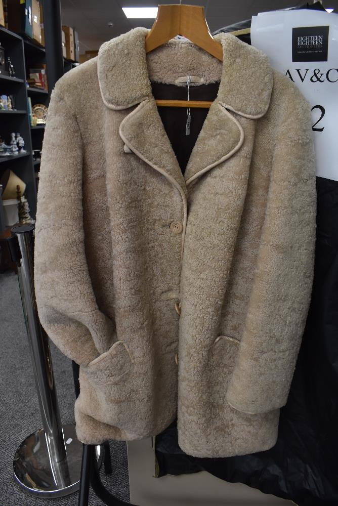 A vintage sheepskin coat,around a medium size.