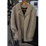 A vintage sheepskin coat,around a medium size.