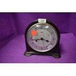 A mid century 8 day bakelite mantel clock